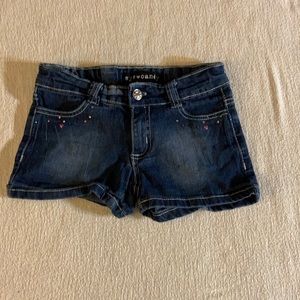 Girls blue denim shorts. Small rhinestones on front and back pockets. Size 8.